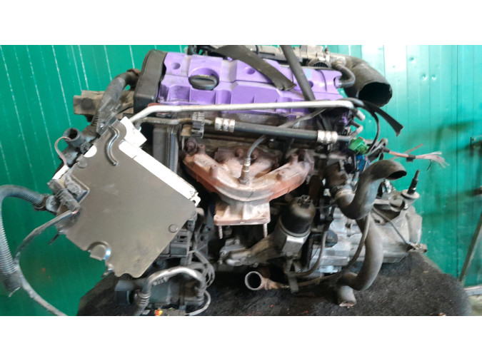 MOTOR CON ACCESORIOS Y CAJA DE CAMBIOS  2004