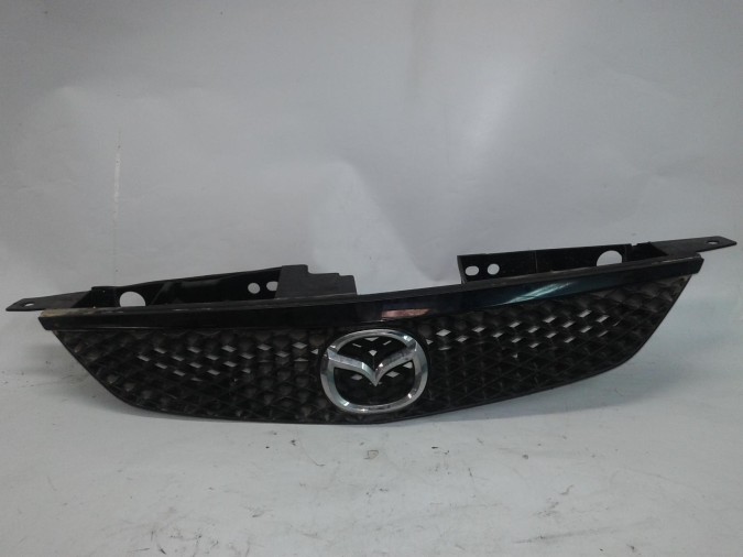 REJILLA SO MAZDA 323 2002