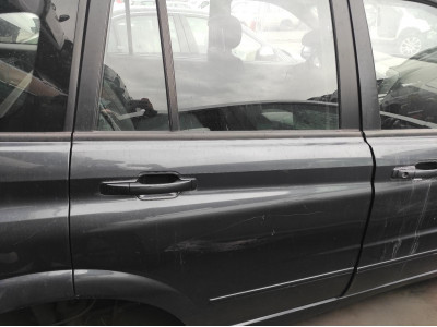 PUERTA TRASERA DERECHA SSANGYONG KYRON 2006