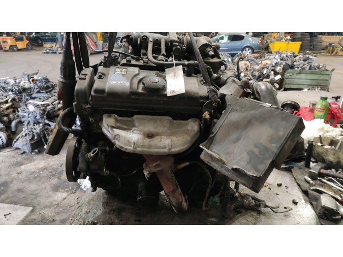 MOTOR CON ACCESORIOS Y CAJA DE CAMBIOS  1999