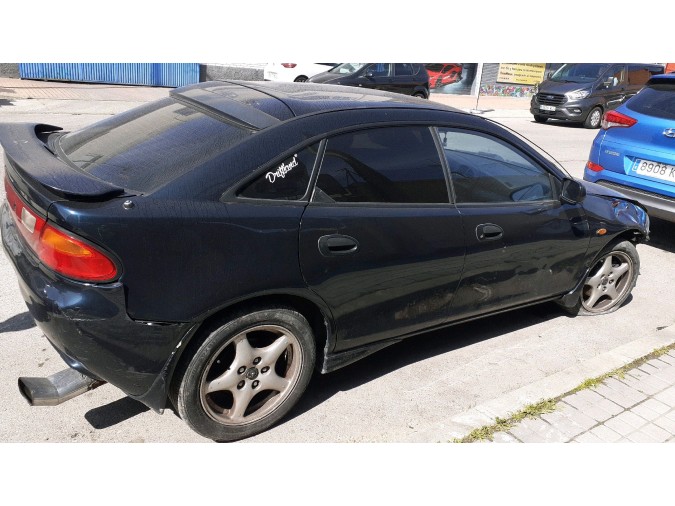 MECANICA TRASERA MAZDA 323 1995