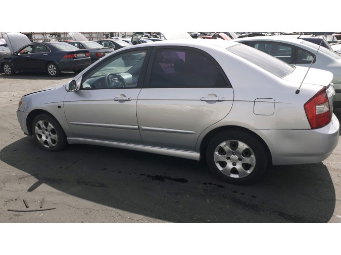 MANDO ELEVALUNAS DELANTERO DERECHO KIA CERATO 2004
