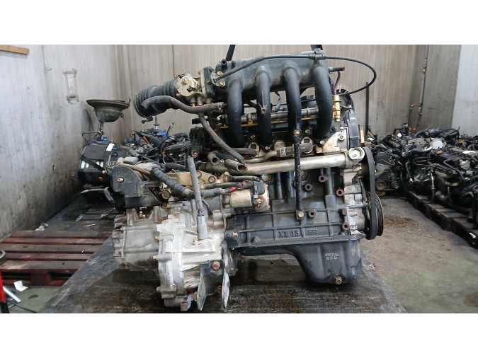 MOTOR CON ACCESORIOS Y CAJA DE CAMBIOS  1998