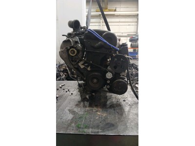 MOTOR CON ACCESORIOS Y CAJA DE CAMBIOS  1999