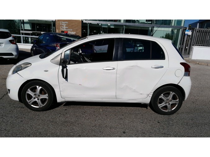ELEVALUNAS TRASERO IZQUIERDO TOYOTA YARIS 2010