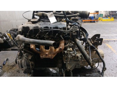 MOTOR CON ACCESORIOS Y CAJA DE CAMBIOS  1999