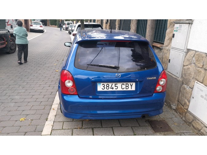 MECANICA TRASERA MAZDA 323 2002