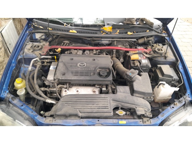 MECANICA TRASERA MAZDA 323 2002