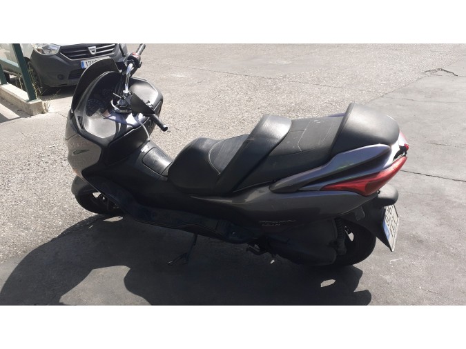 FARO (MOTO) SO HONDA NSS250 2006