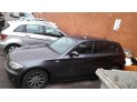 ELEVALUNAS TRASERO IZQUIERDO BMW 120D 2005