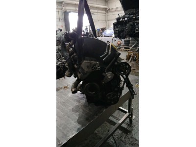 MOTOR CON ACCESORIOS Y CAJA DE CAMBIOS  2000