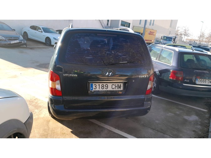 PUERTA TRASERA IZQUIERDA HYUNDAI TRAJET 2003