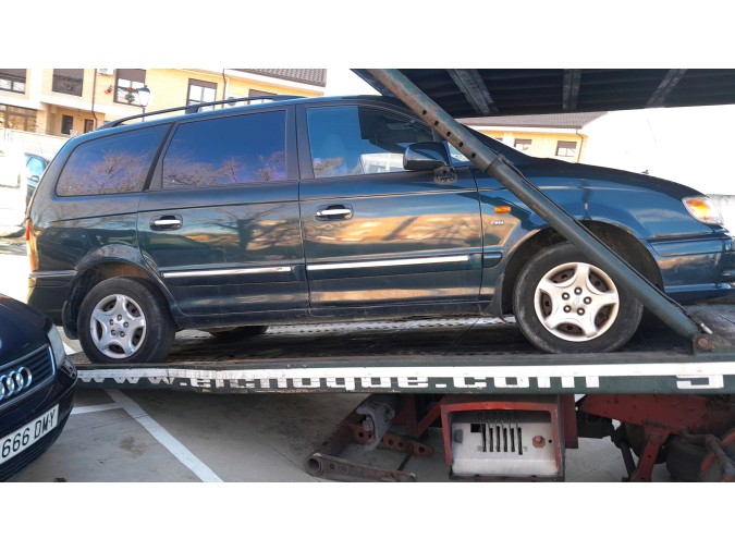 PUERTA TRASERA IZQUIERDA HYUNDAI TRAJET 2003