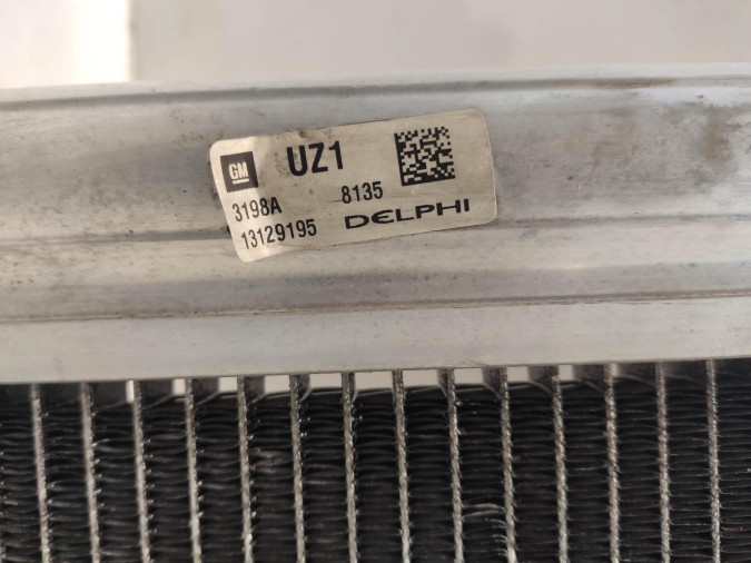 Radiador A/C OPEL ASTRA 2009