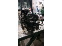 MOTOR CON ACCESORIOS Y CAJA DE CAMBIOS 