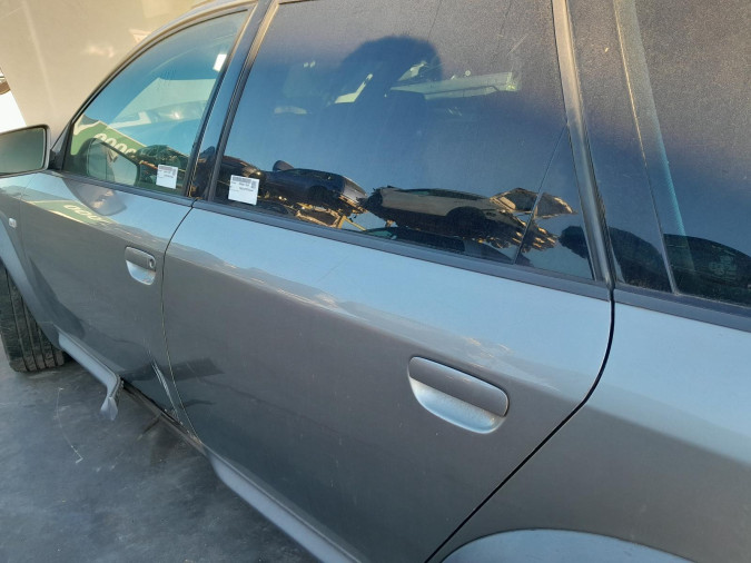 PUERTA TRASERA IZQUIERDA OPEL ASTRA 2002