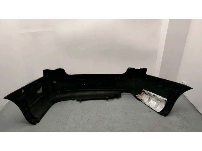 PARAGOLPES TRASERO VOLKSWAGEN PASSAT NEGRO 2006